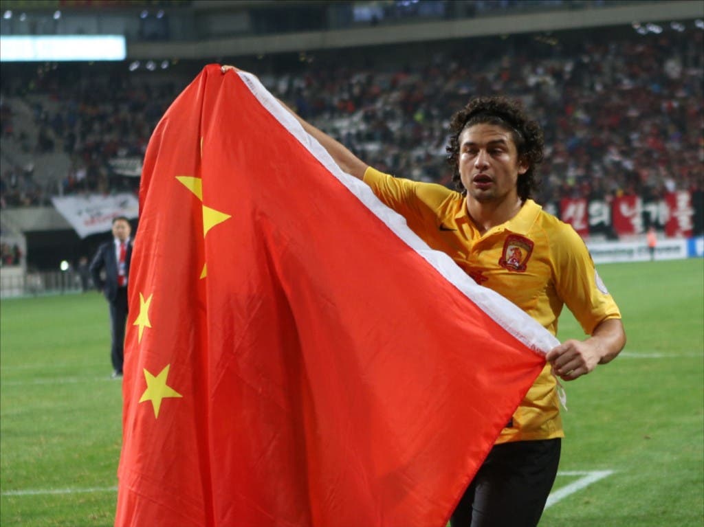 <p>Elkeson, ici en 2013 après la finale de la Ligue des Champions asiatique, a été naturalisé cette semaine. (AFP/STRINGER &#8211; IMAGINECHINA / IMAGINECHINA)<br />
Brazilian football player Elkeson de Oliveira Cardoso, or simply Elkeson, of Guangzhou Evergrande Taobao F.C. is included in the Chinese national training list as the first naturalized football player in the national football team in China, 22 August 2019.</p>
